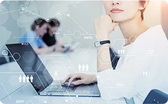 HR professional using a laptop with digital icons, symbolizing advanced Human Outsourcing